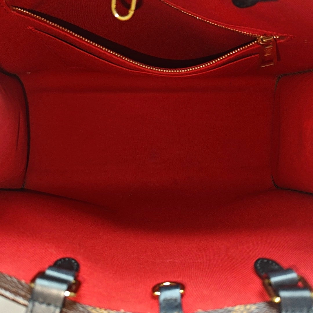 ONTHEGO MM Monogram Coated Canvas Brown