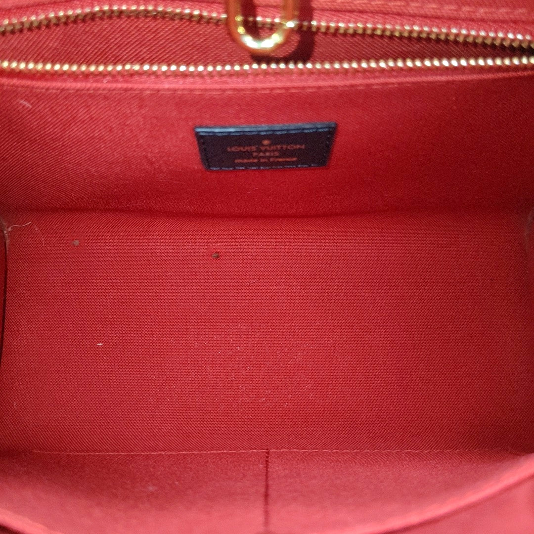 ONTHEGO PM Monogram Coated Canvas Brown