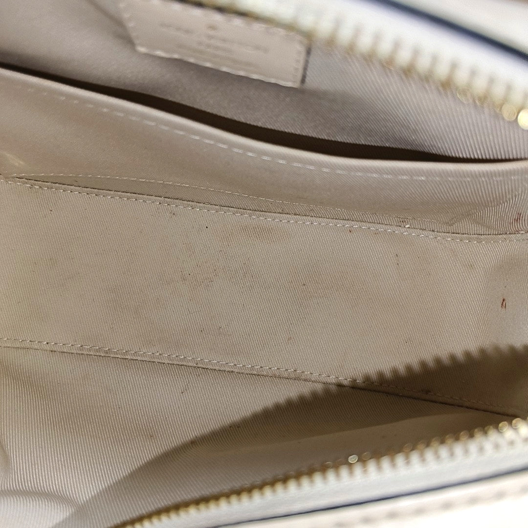 SAINTONGE Monogram Coated Canvas Brown