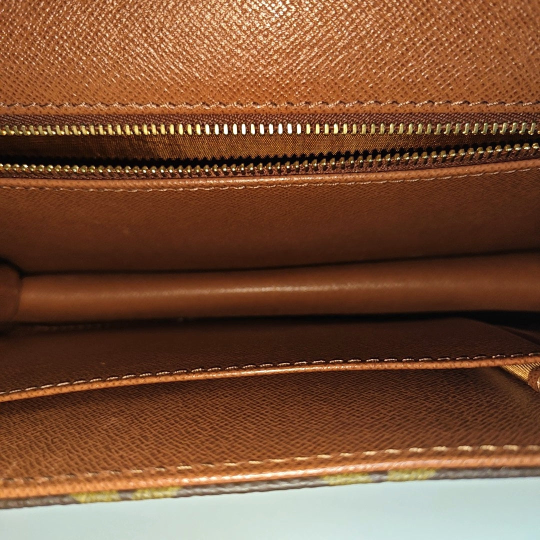 DAME Monogram Coated Canvas Brown