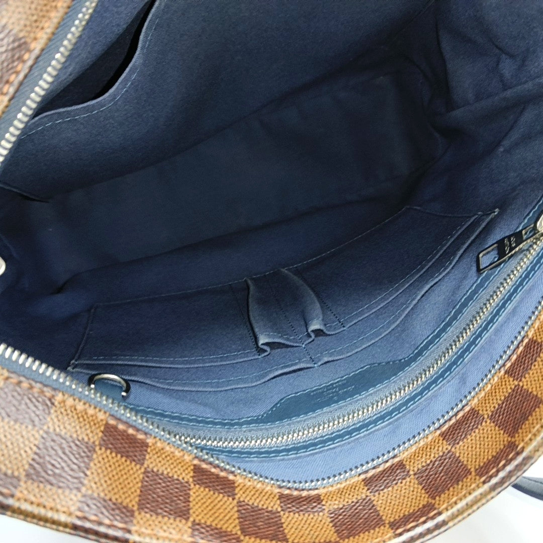 Damier Ebene Coated Canvas Brown