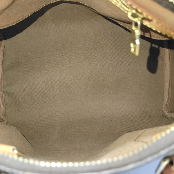 SPEEDY 25 Monogram Coated Canvas Brown