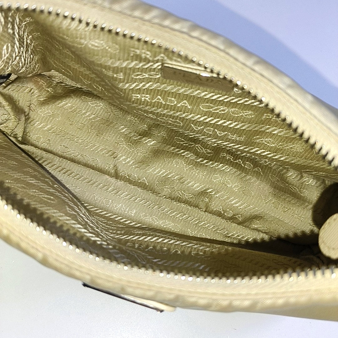 Authenticated pre-owned  Re-Edition2005 Nylon Beige - Crossbody Bag at Looply