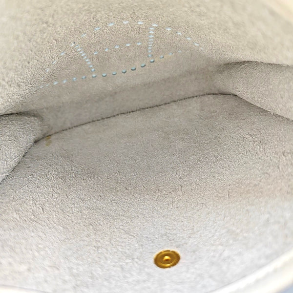 Evelyne TPM Clemence White