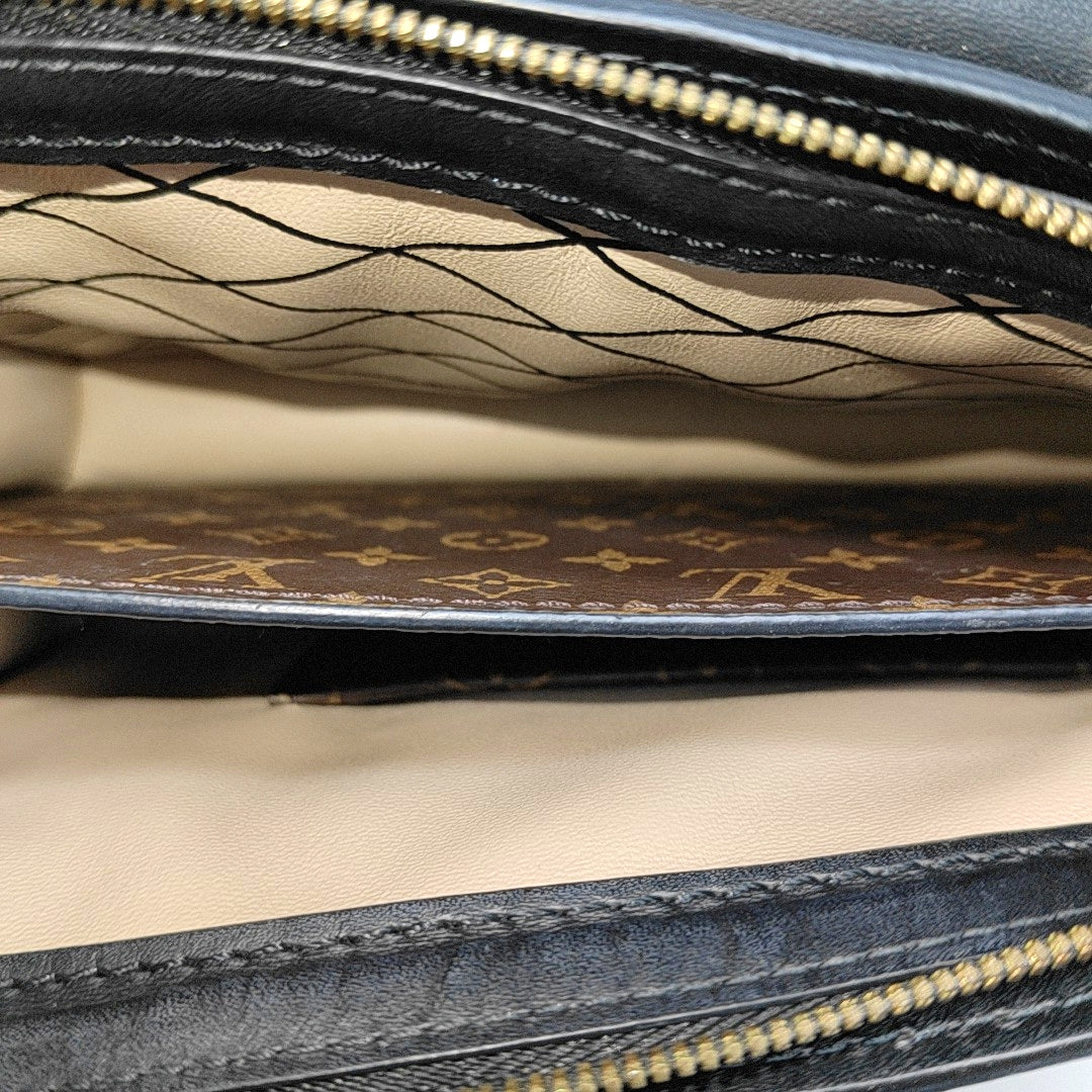 TRUNK Monogram Coated Canvas Brown