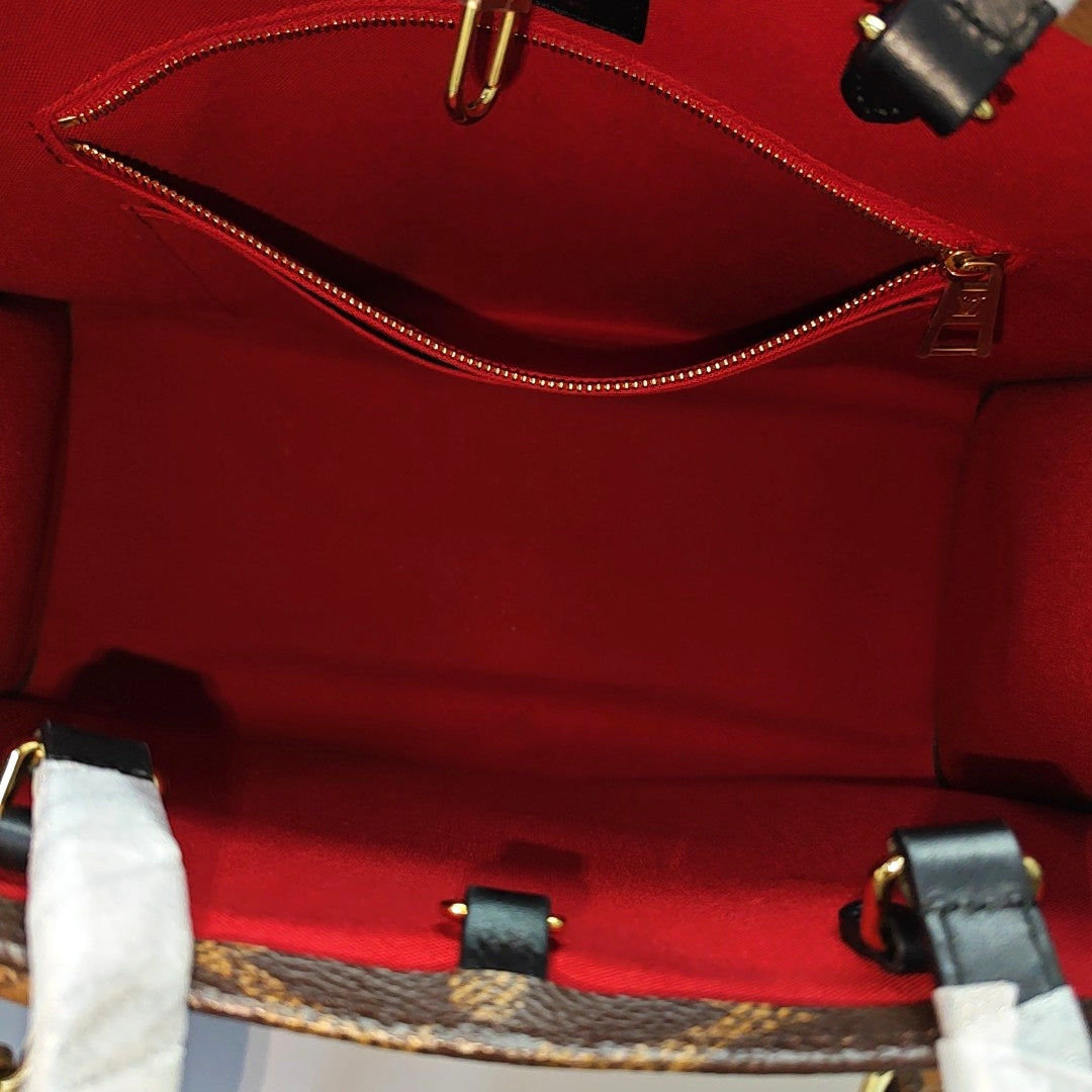 ONTHEGO MM Monogram Coated Canvas Brown