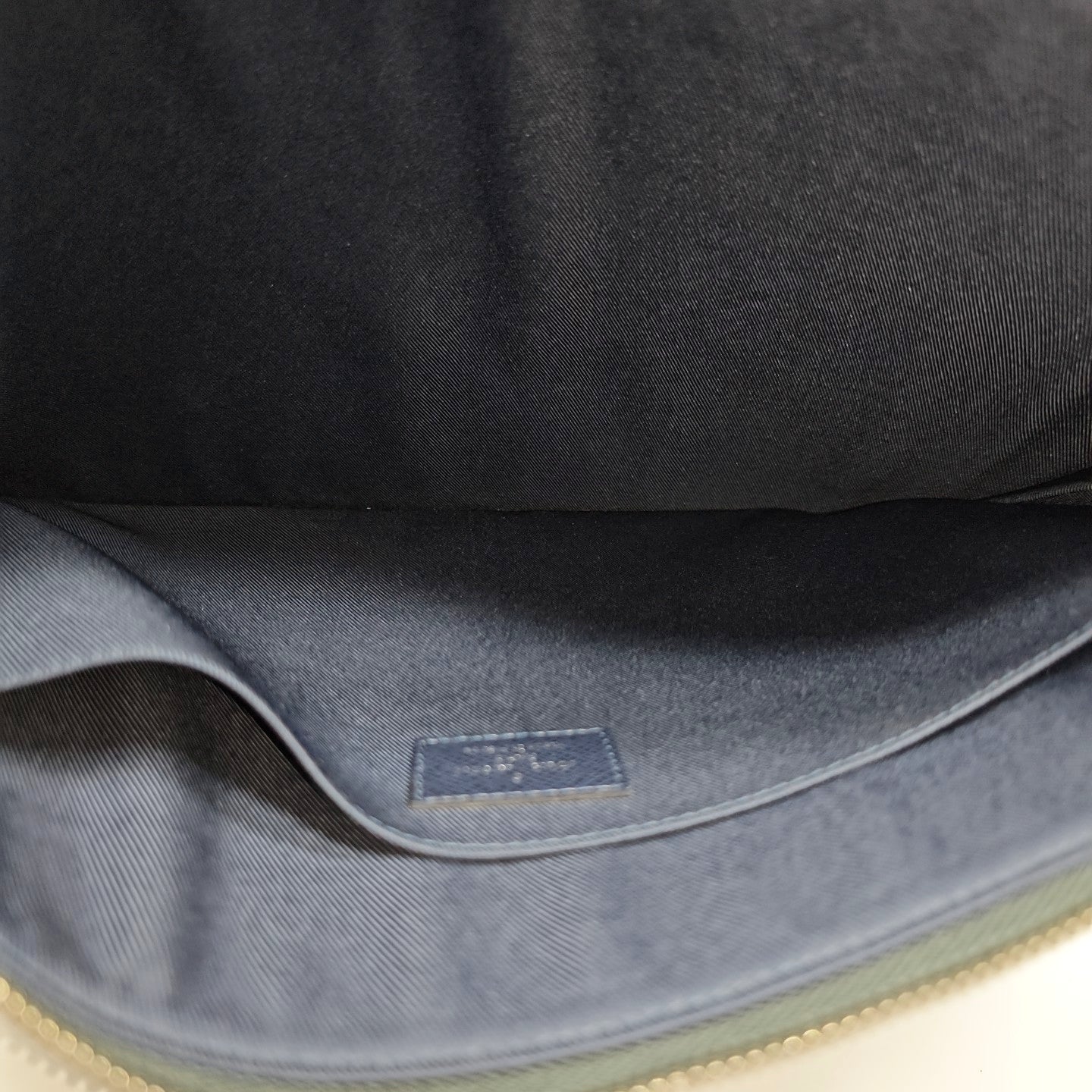 Monogram Coated Canvas Clutch Blue