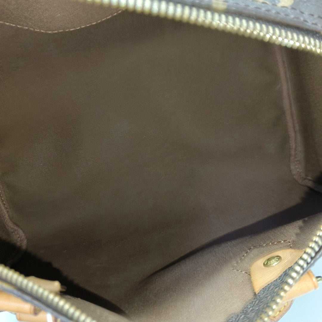 SPEEDY 30 Monogram Coated Canvas Brown