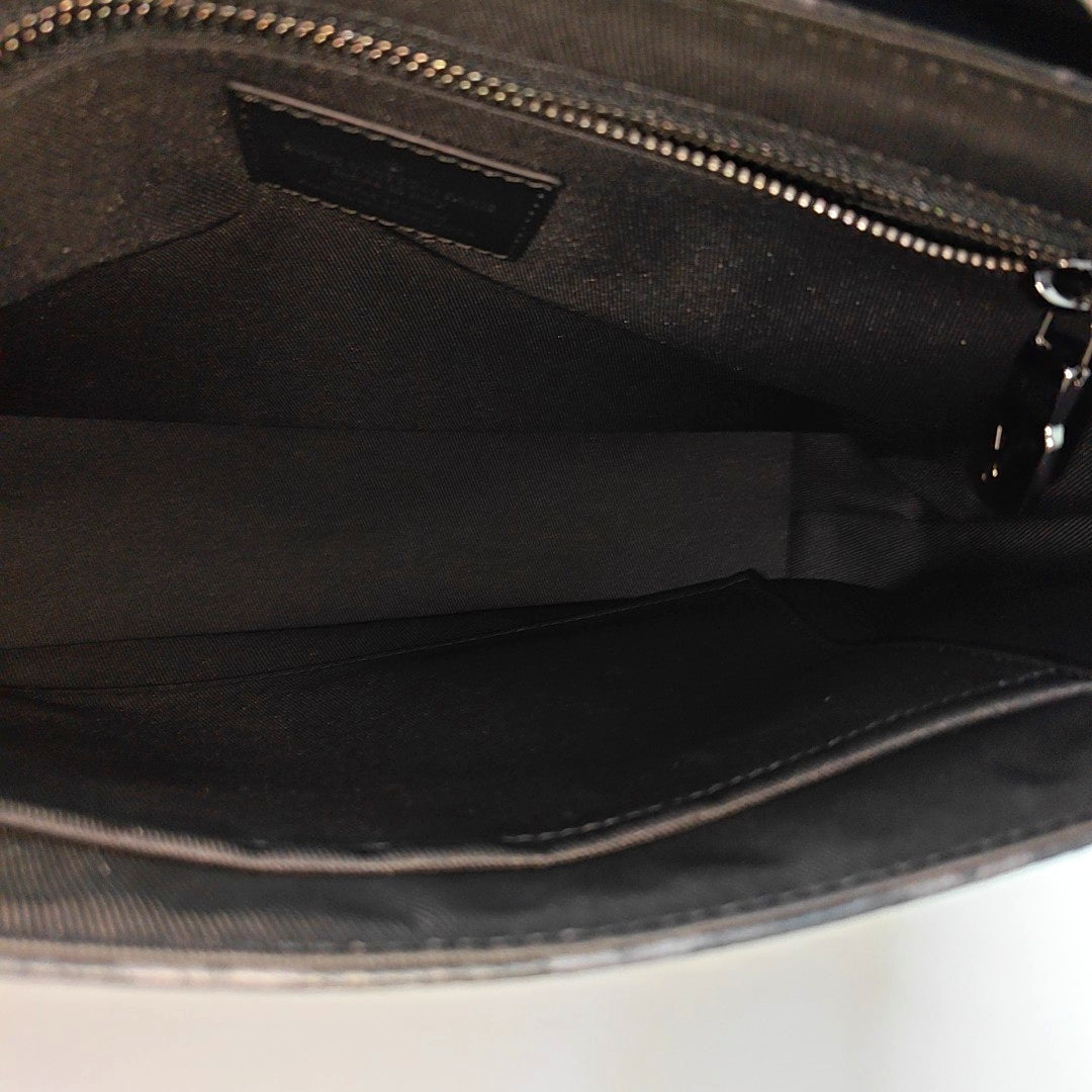 VOYAGER PM Monogram Coated Canvas Black