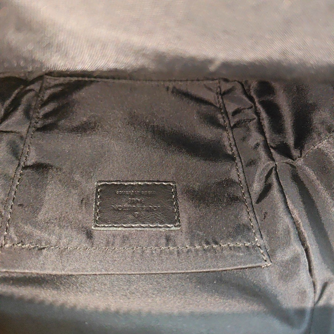 PALM SPRINGS Mini Monogram Coated Canvas Brown