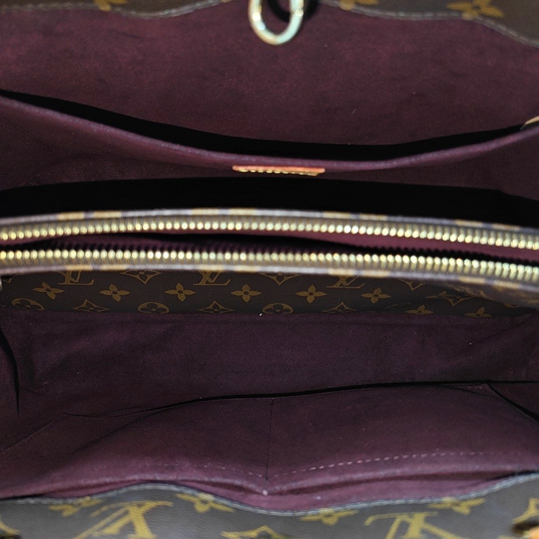 MONTAIGNE GM Monogram Coated Canvas Brown