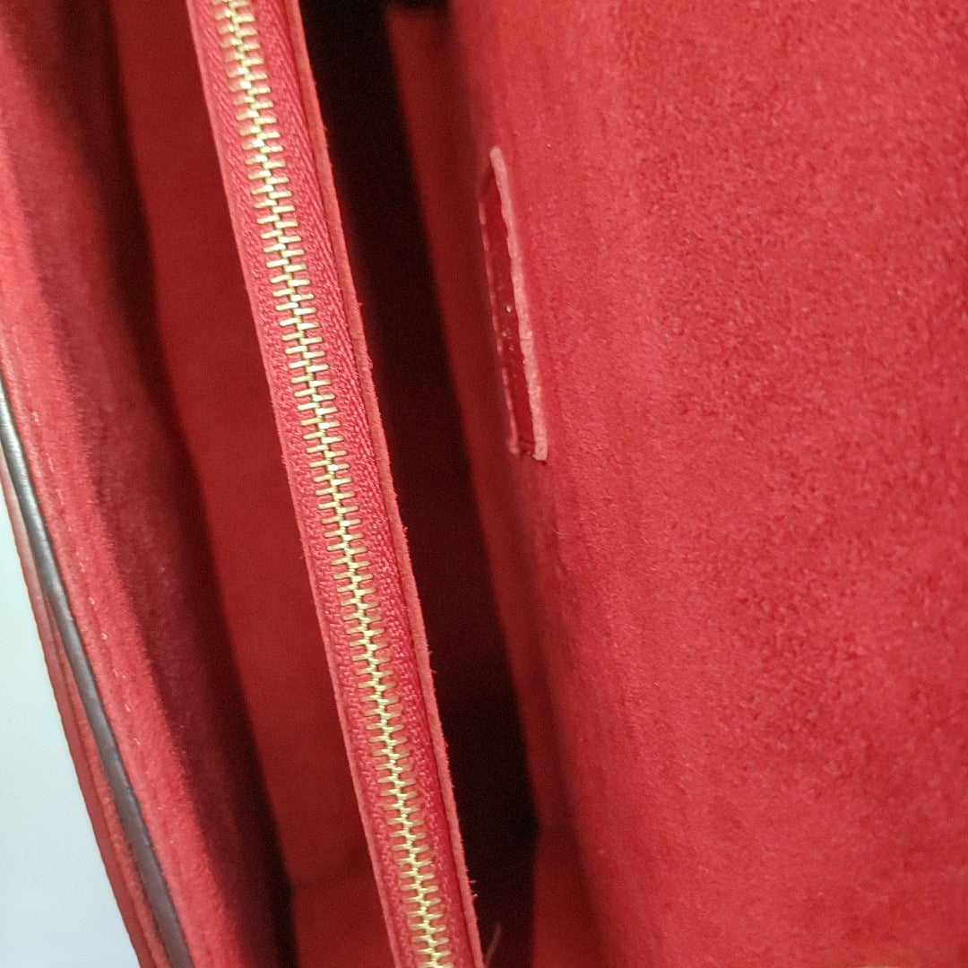 VICTOIRE Monogram Coated Canvas Brown