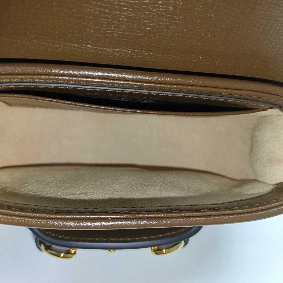 Authenticated pre-owned  Horsebit 1955 Monogram Coated Canvas Beige - Shoulder Bag at Looply
