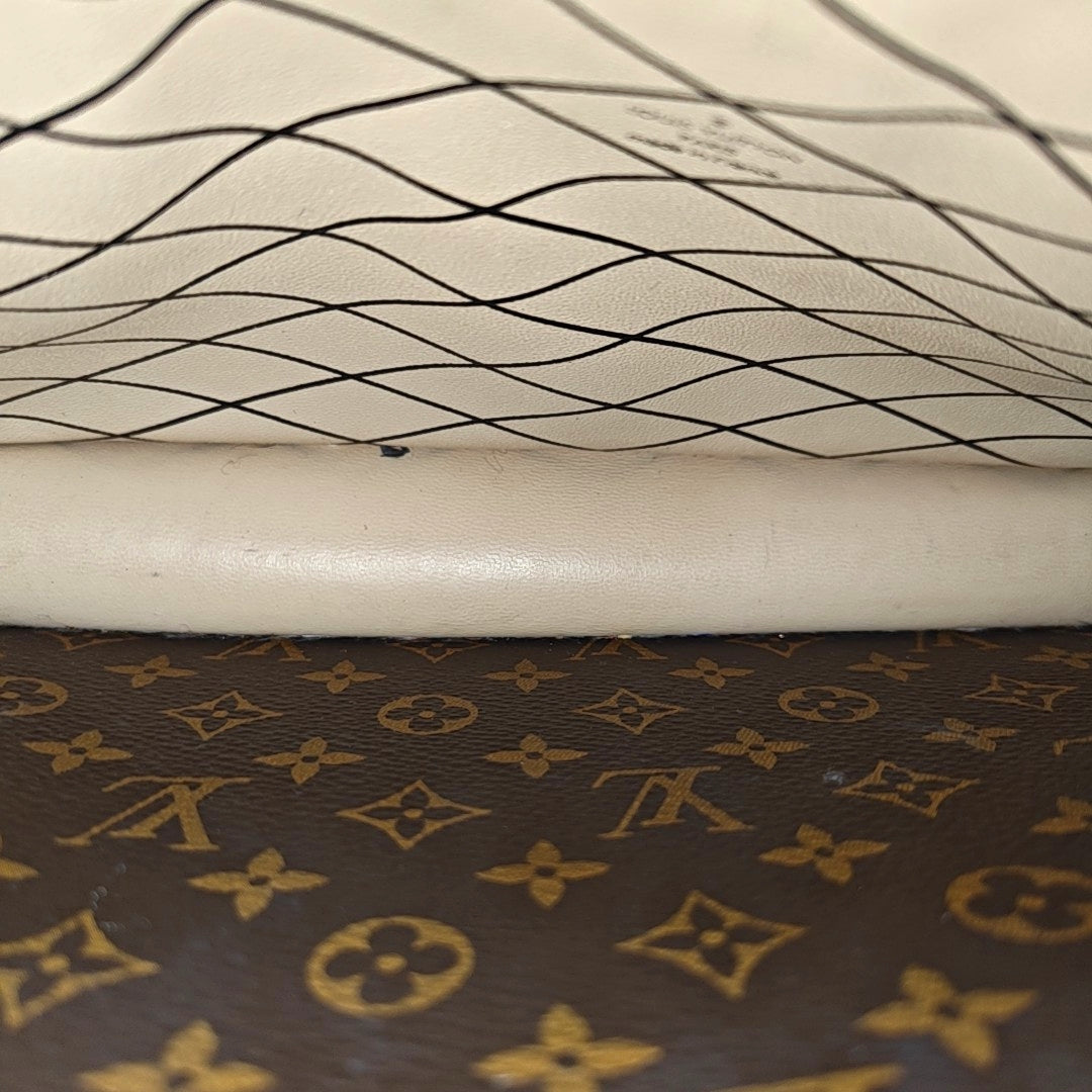 TRUNK Monogram Coated Canvas Brown
