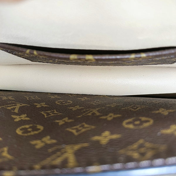 TRUNK Monogram Coated Canvas Brown