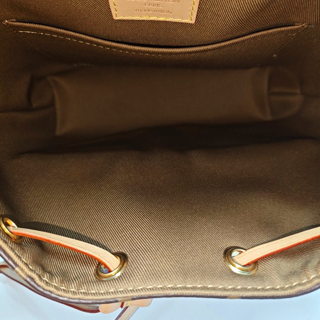 EXCURSION PM Monogram Coated Canvas Brown