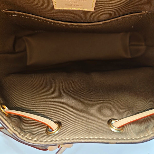 EXCURSION PM Monogram Coated Canvas Brown