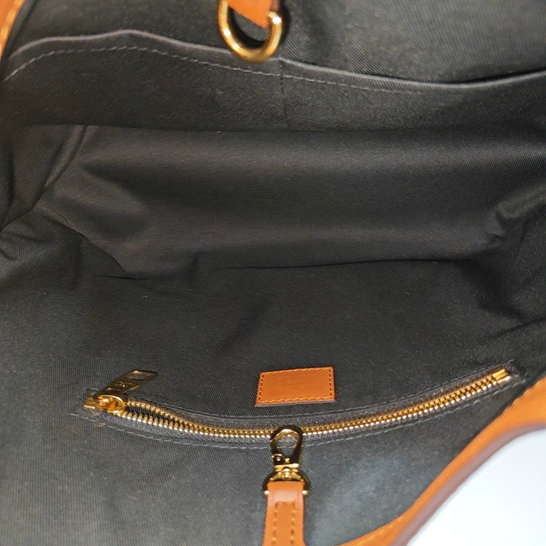 DAUPHINE MM Monogram Coated Canvas Brown