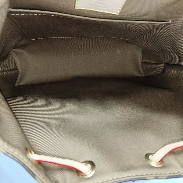 EXCURSION PM Monogram Coated Canvas Brown