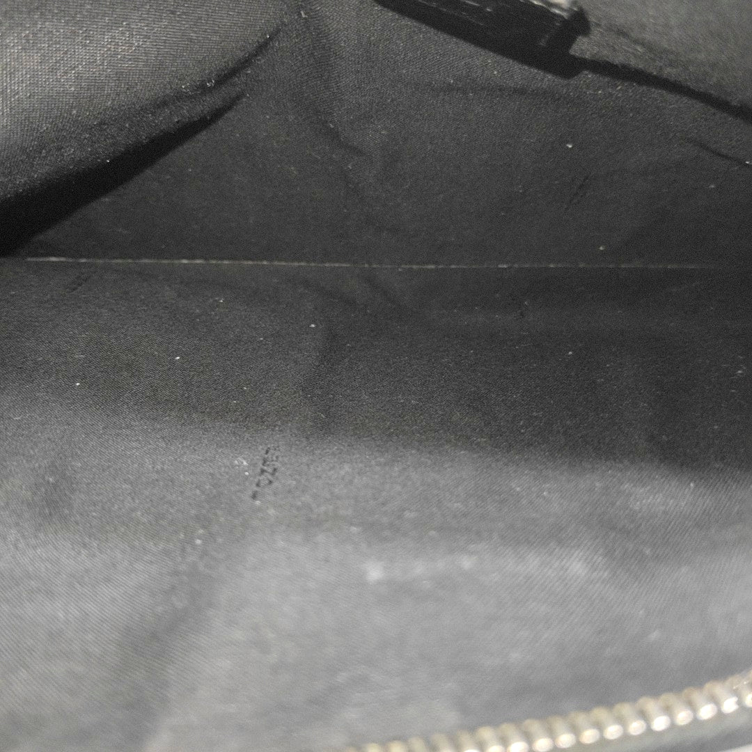 Authenticated pre-owned  Monster Calfskin Black - Clutch at Looply
