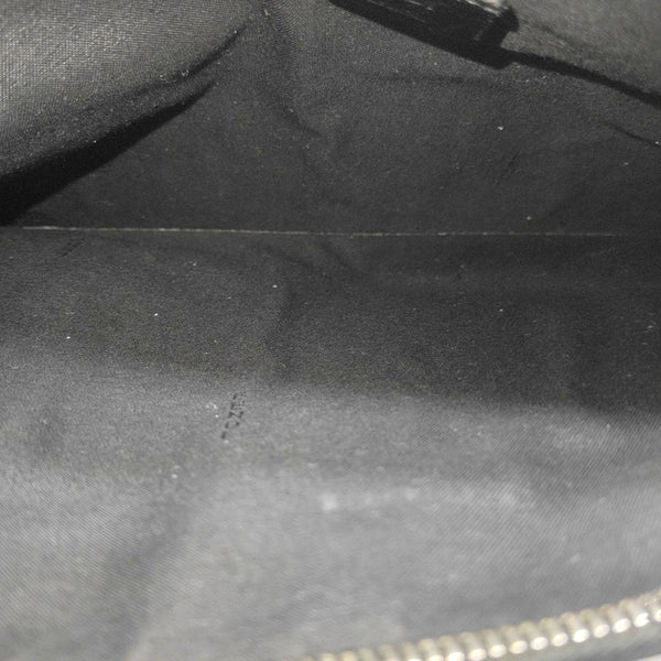 Authenticated pre-owned  Monster Calfskin Black - Clutch at Looply