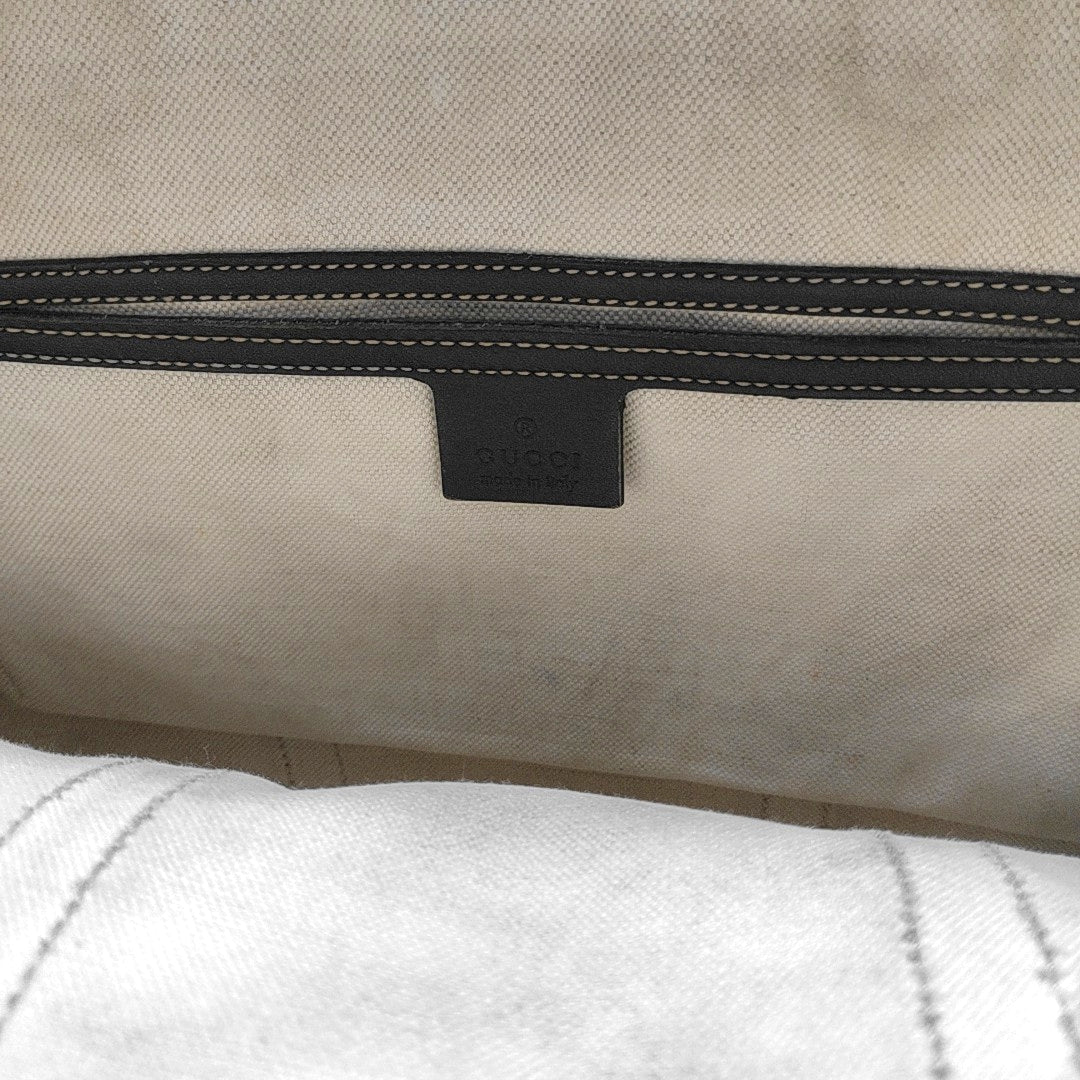 Duffle Monogram Coated Canvas Beige