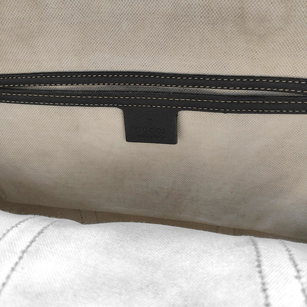 Duffle Monogram Coated Canvas Beige