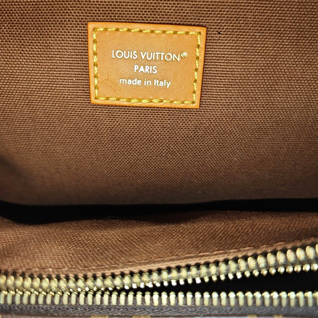 RUSH Monogram Coated Canvas Brown