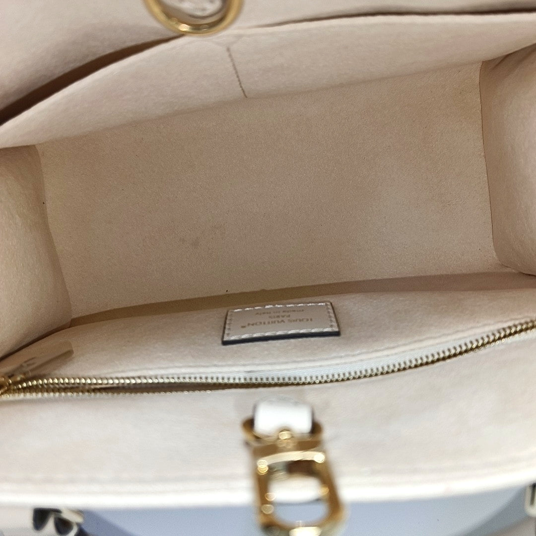 ONTHEGO PM Monogram Calfskin Beige