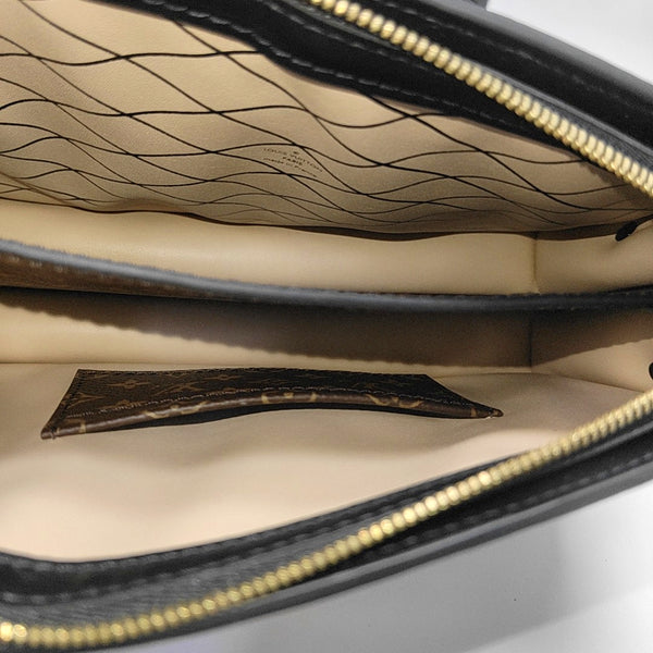 TRUNK Monogram Coated Canvas Brown