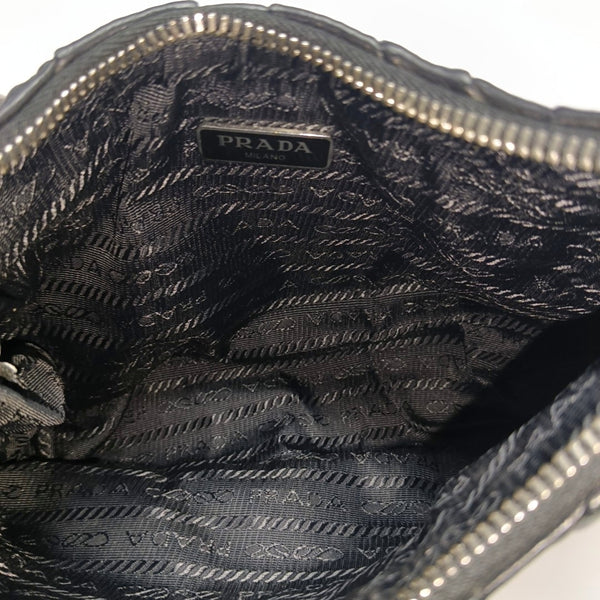 Authenticated pre-owned  Re-Edition2005 Quilted Lambskin Black - Top Handle Bag at Looply