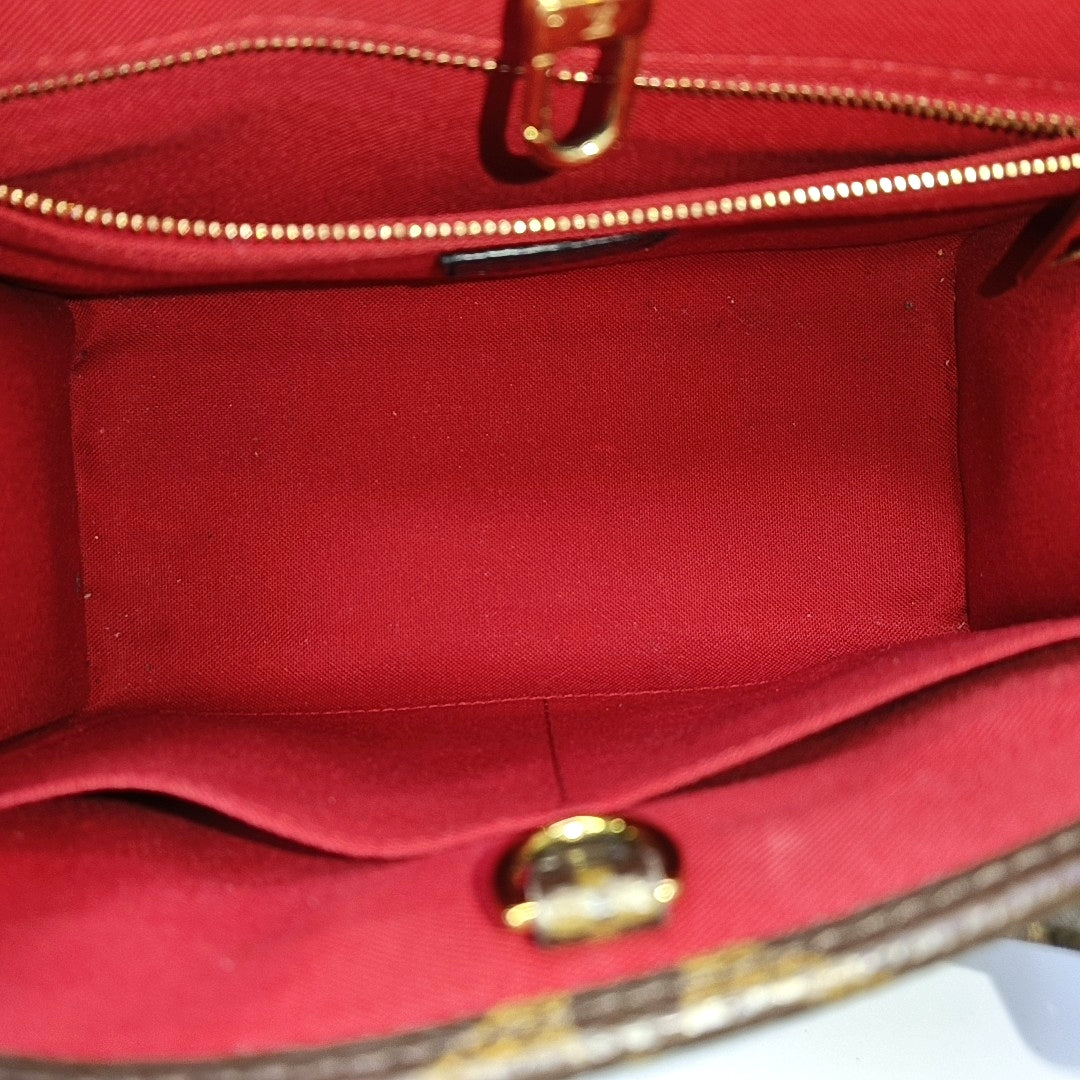 ONTHEGO PM Monogram Coated Canvas Brown