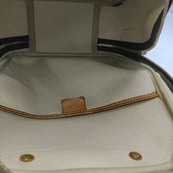 EXCURSION Monogram Coated Canvas Brown