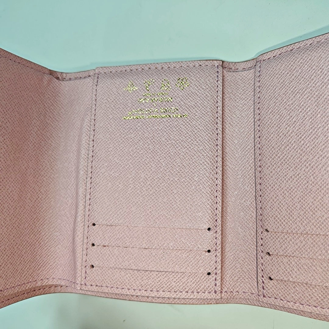 INTERNATIONAL Monogram Coated Canvas Brown Wallet