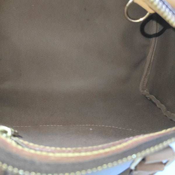 SPEEDY 25 Monogram Coated Canvas Brown