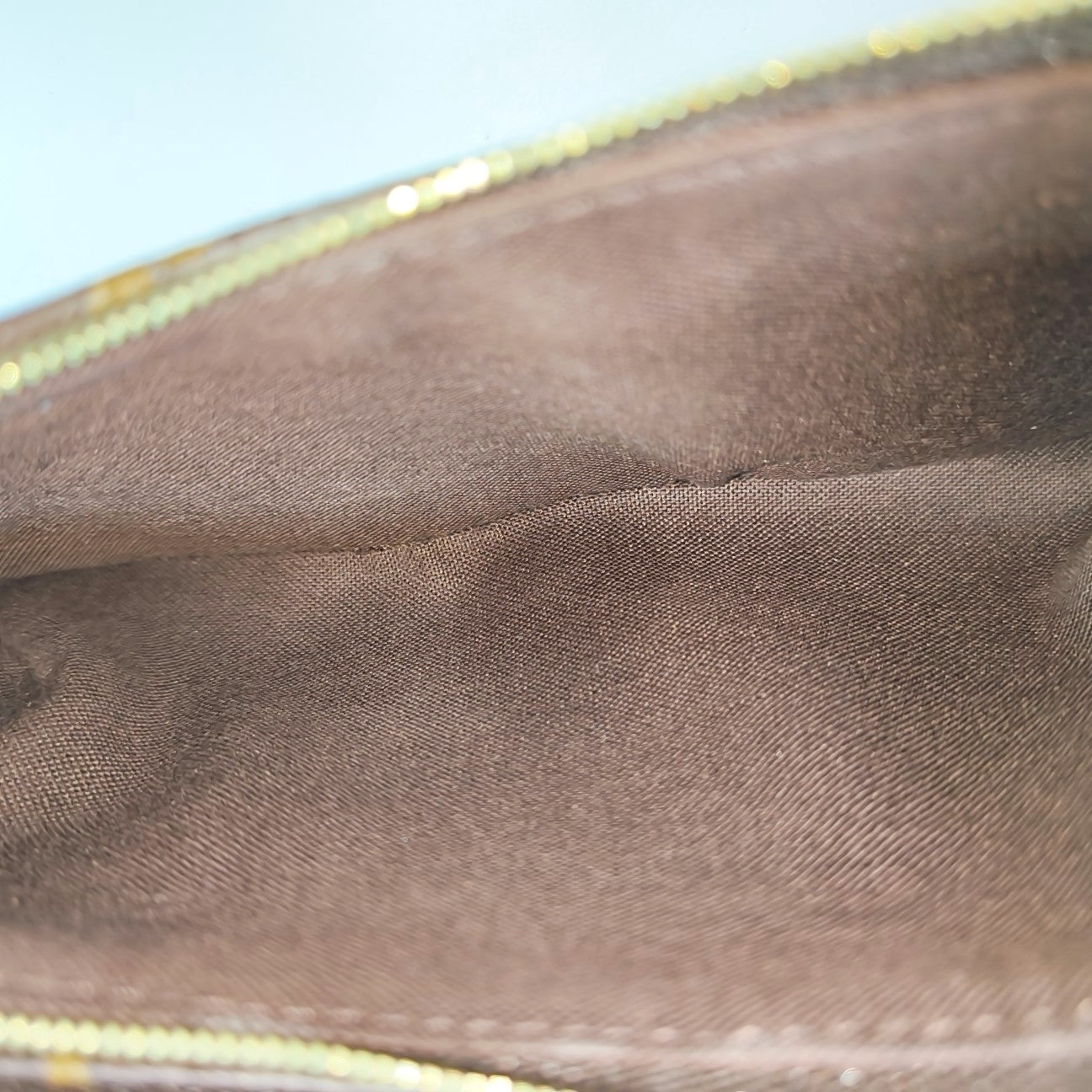 LIV POCHETTE Monogram Coated Canvas Brown