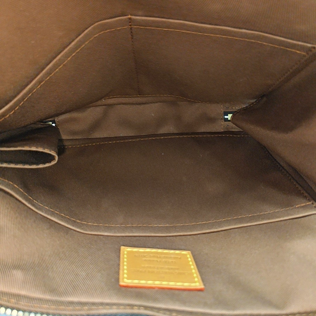 SOFT TRUNK PM Monogram Coated Canvas Brown