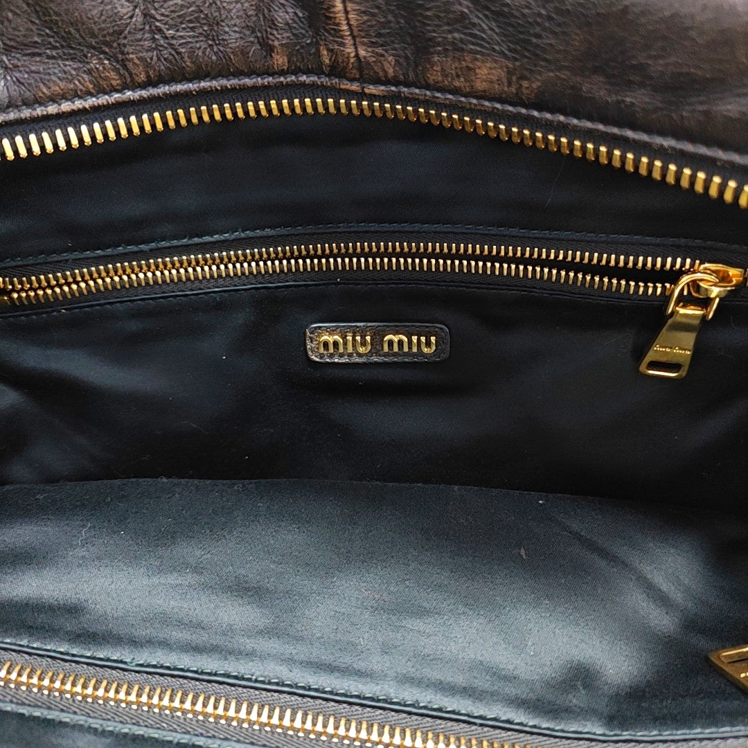 Authenticated pre-owned  Beau Large Calfskin Brown - Top Handle Bag at Looply