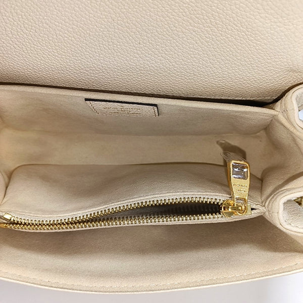MÉTIS EAST WEST Monogram Calfskin Beige