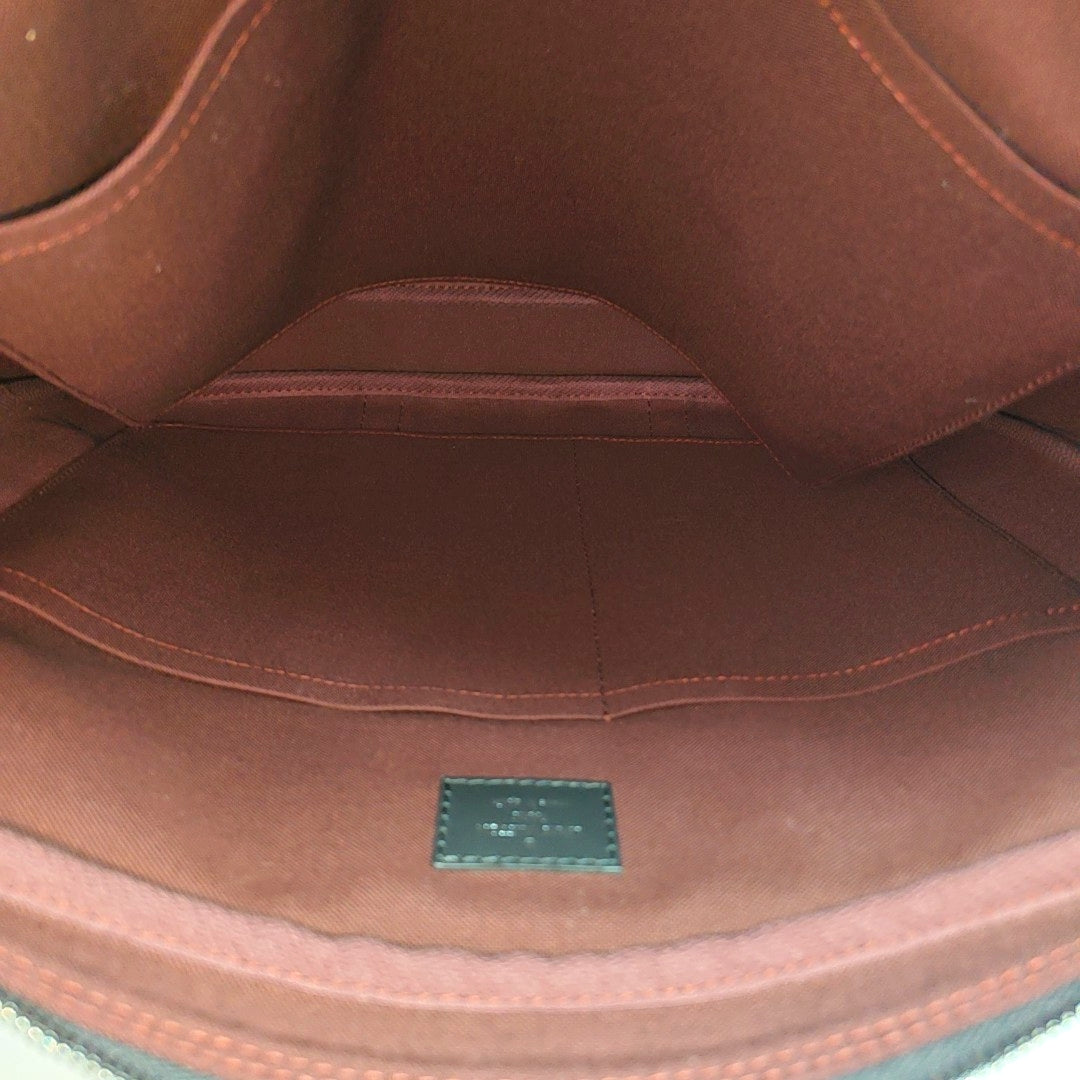 PORTE-DOCUMENTS PM Monogram Coated Canvas Brown