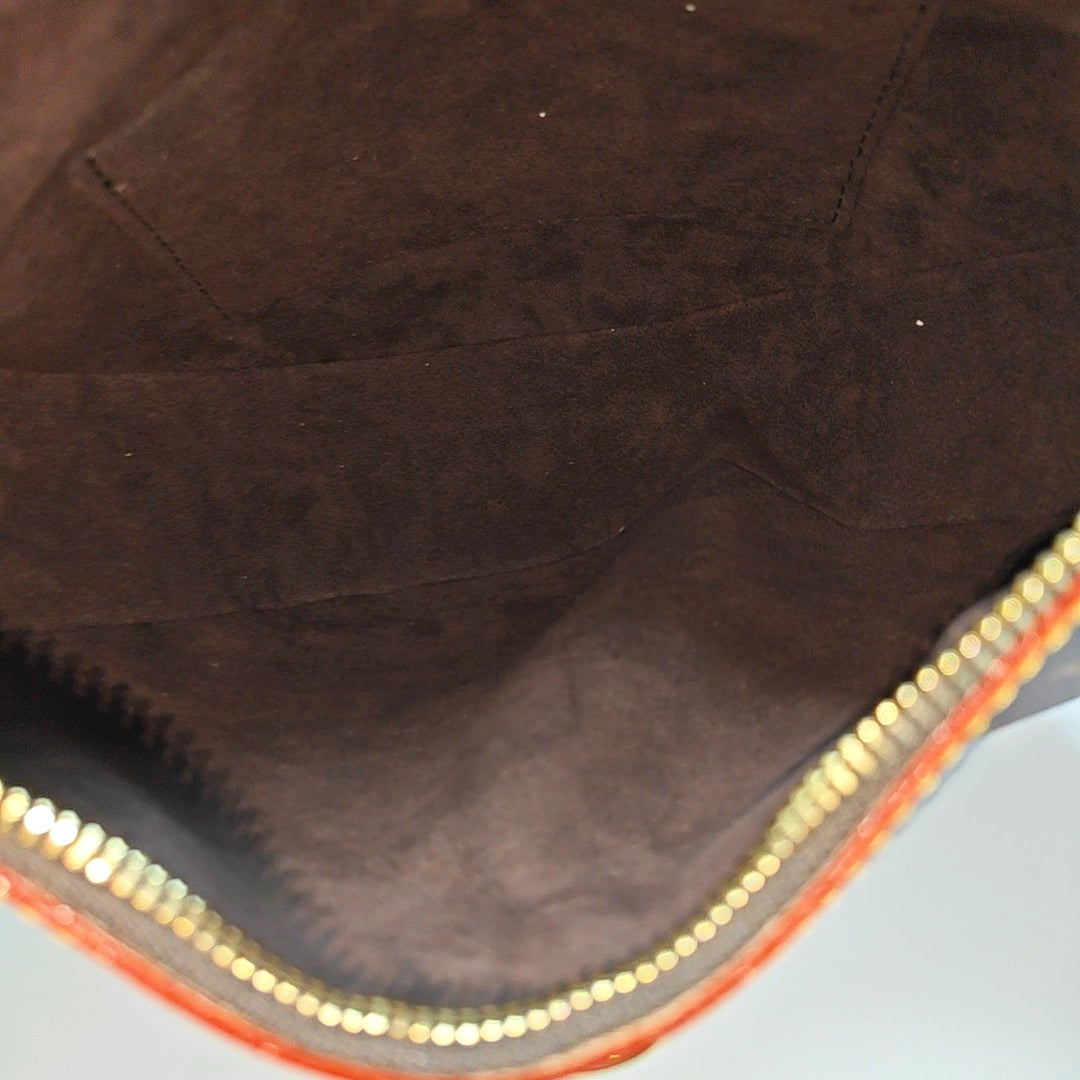 LOOPING Monogram Coated Canvas Brown