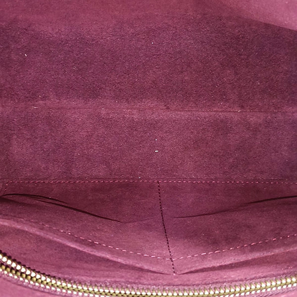 CARRYALL PM Monogram Coated Canvas Brown