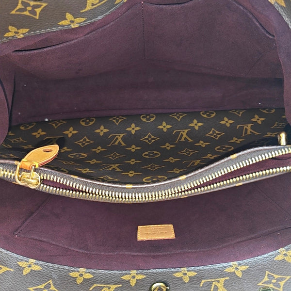 MONTAIGNE GM Monogram Coated Canvas Brown