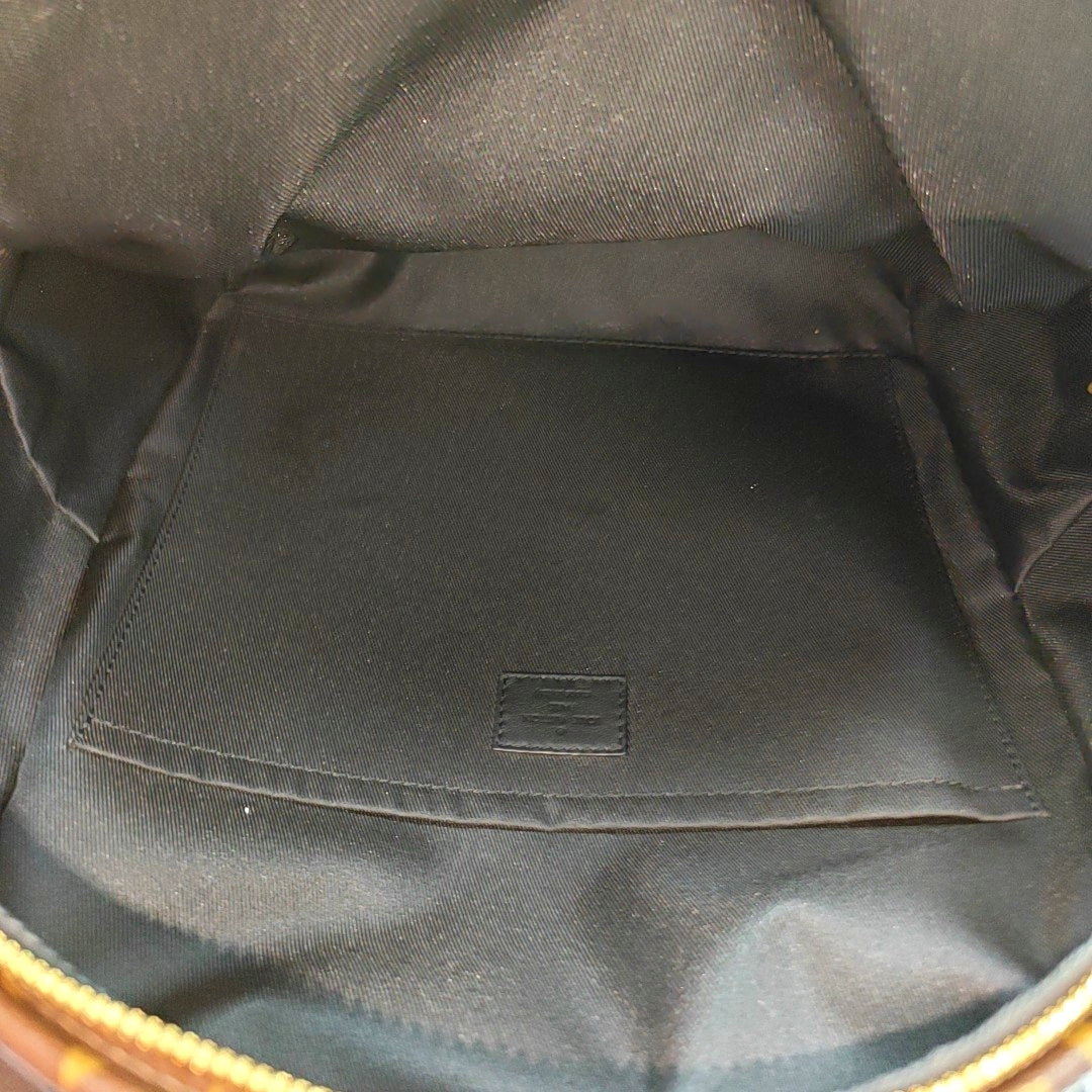 Monogram Coated Canvas Backpack Brown