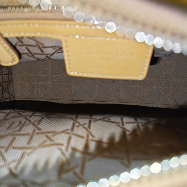 Authenticated pre-owned  Lady Dior Quilted Patent Leather Yellow - Tote Bag at Looply