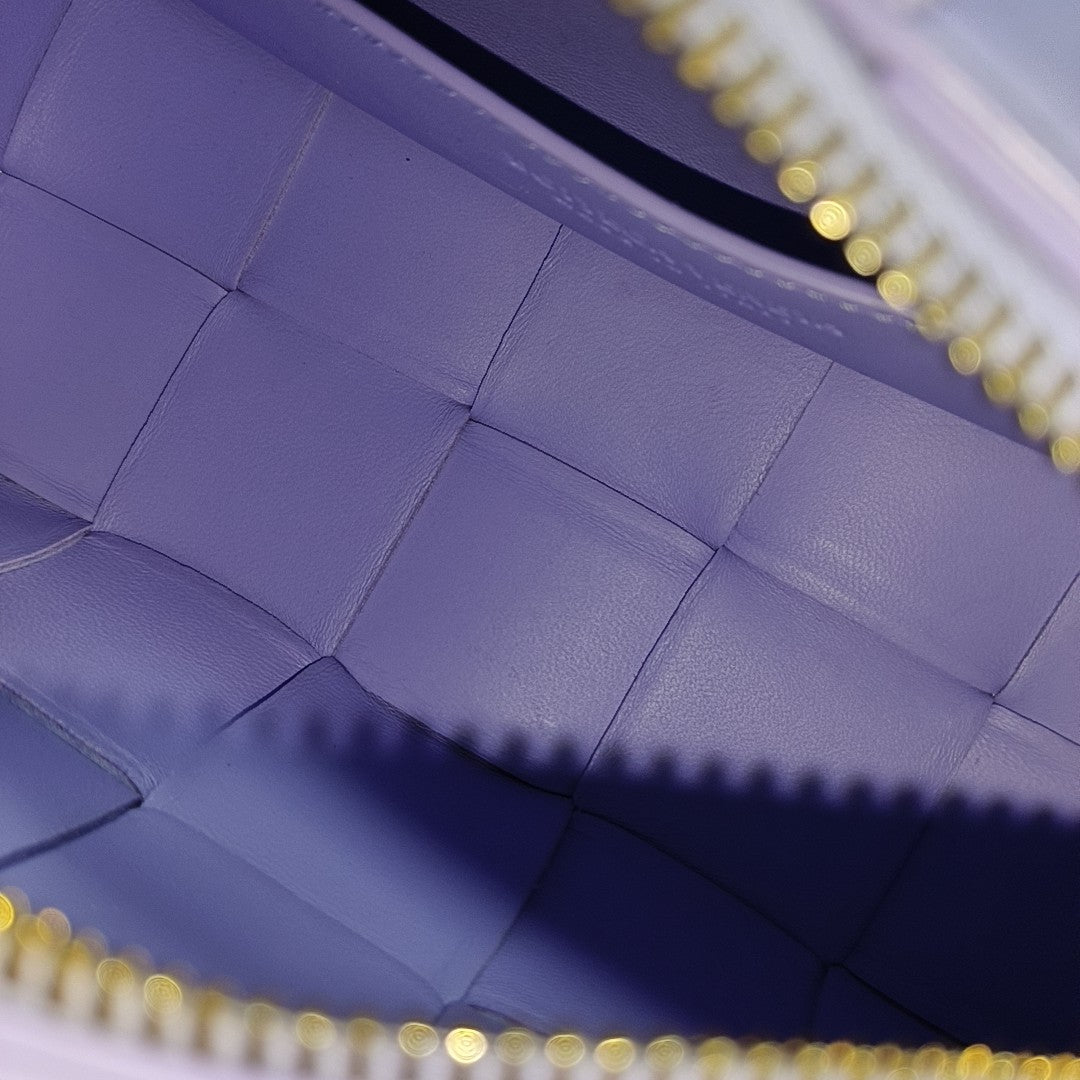 Authenticated pre-owned  Intrecciato Small Lambskin Purple - Top Handle Bag at Looply
