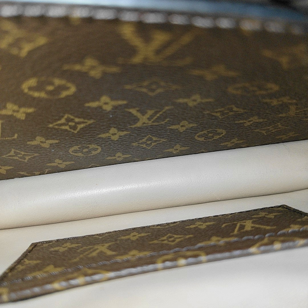 TRUNK Monogram Coated Canvas Brown