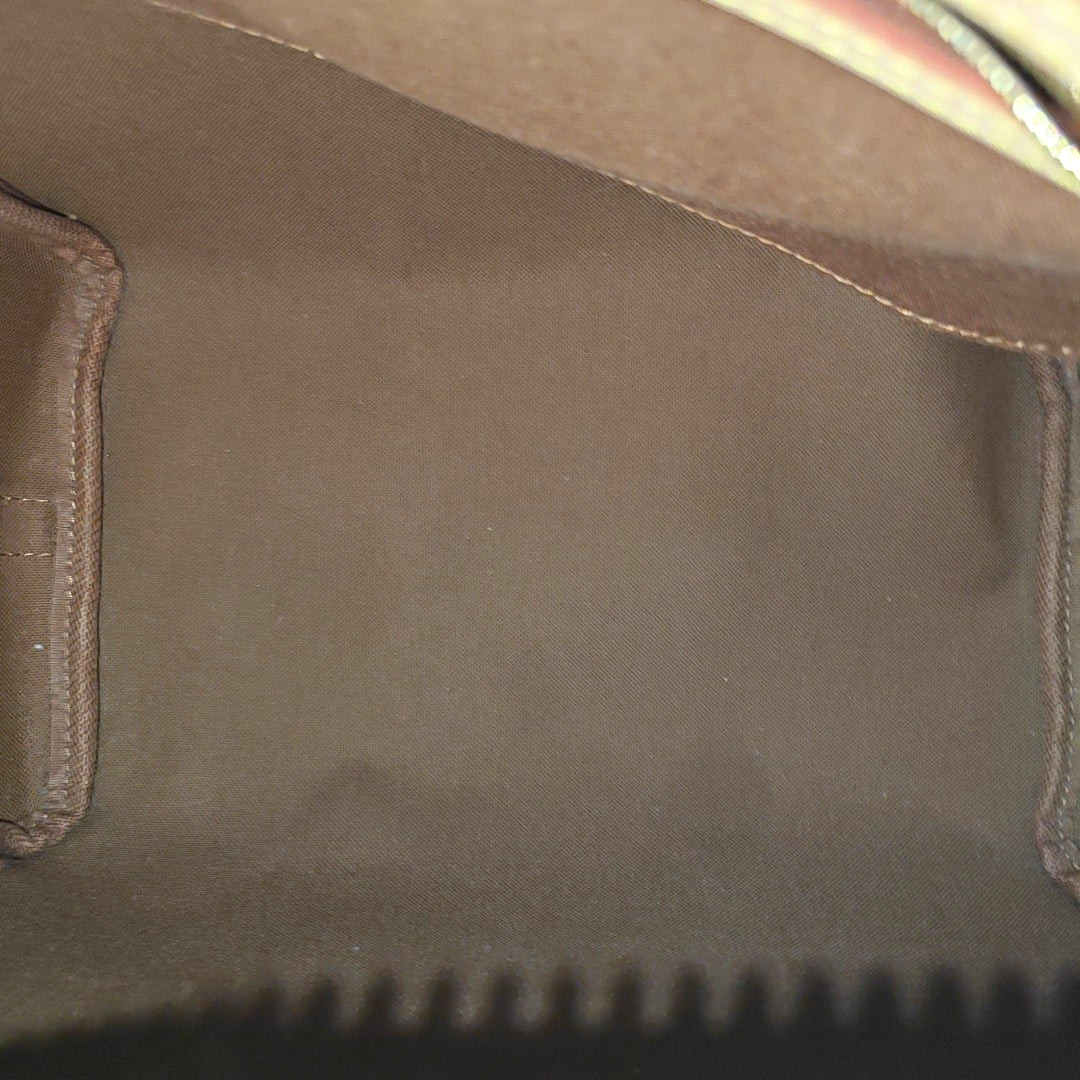 SPEEDY 25 Monogram Coated Canvas Brown