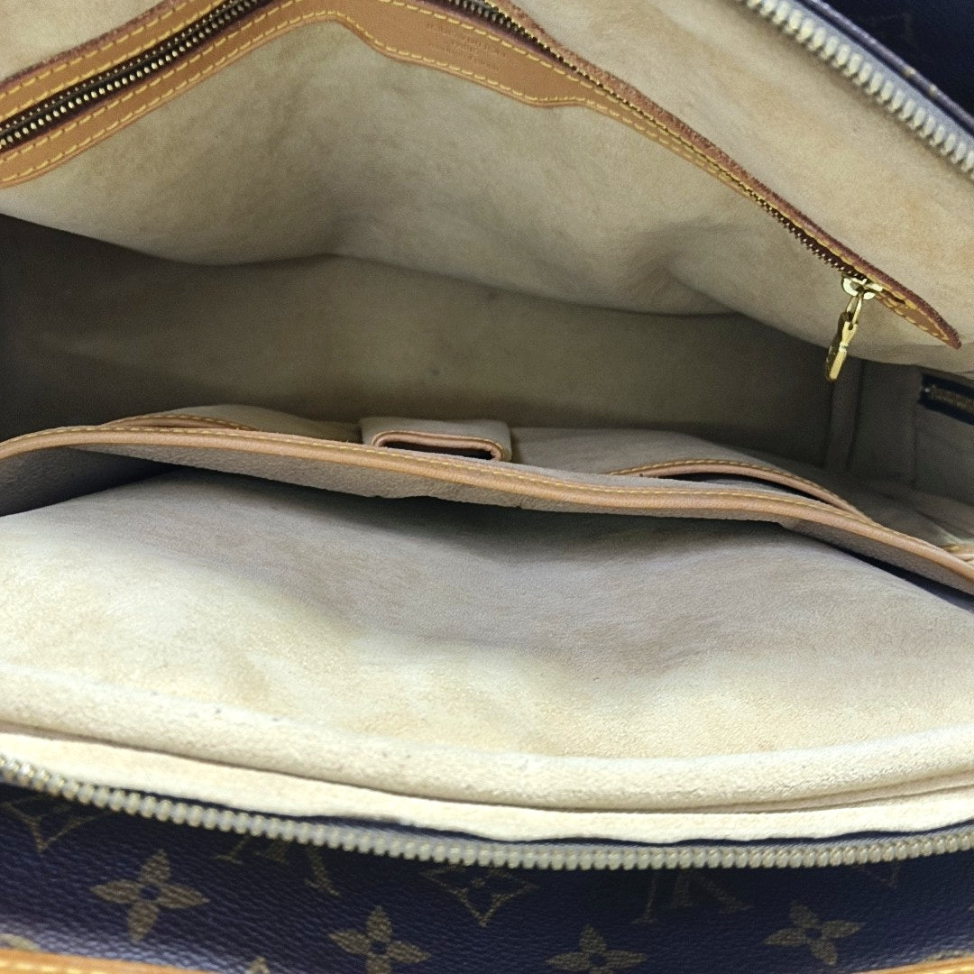 VINTAGE RIVOLI Monogram Coated Canvas Brown