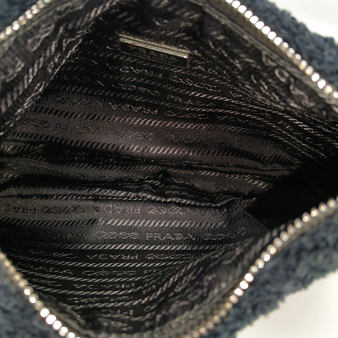Authenticated pre-owned  Re-Edition2000 Mini Fabric Blue - Top Handle Bag at Looply